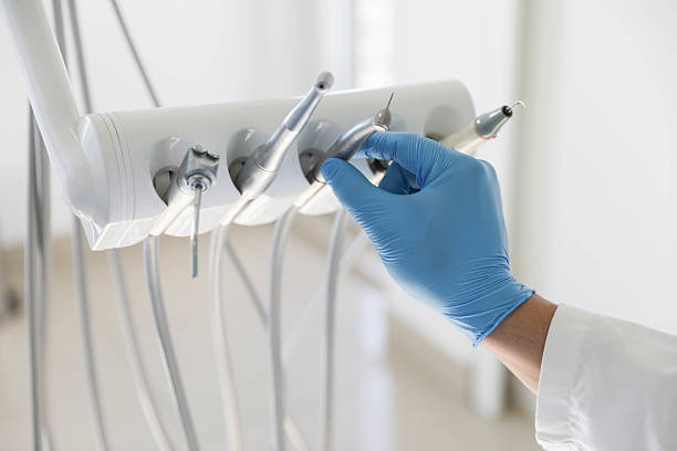 Professional Emergency Dentist technician working in Bal Harbour, FL